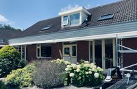 Achterzijde bungalow in Abbekerk.